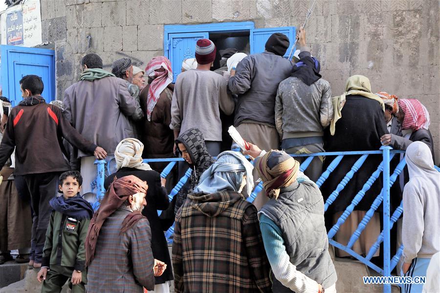 YEMEN-SANAA-FAMINE-BREAD DISTRIBUTION