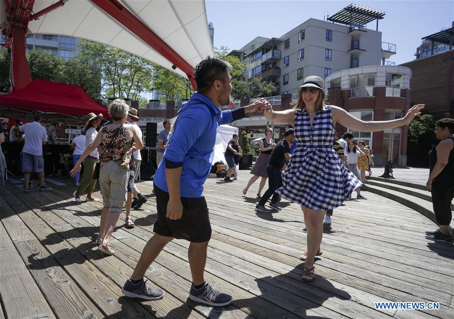 CANADA-VANCOUVER-DANCING ON THE STREET