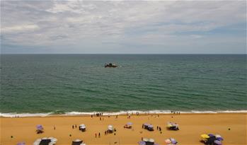 Beautiful coastal scenery of China's Boao attracts tourists during summer