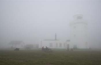 Thick fog shrouds Dover, Britain