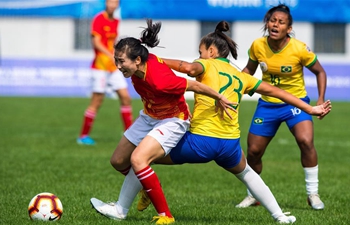 10-woman Chinese soccer team sees off Brazil 2-1 in overtime, into military games final